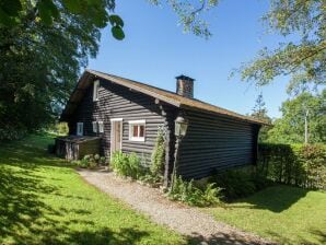 Open wooden chalet built against a hill. - Malmedy - image1