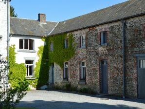 Denkmalgeschütztes Schloss im dichten Wald in Roumont - Tenneville - image1