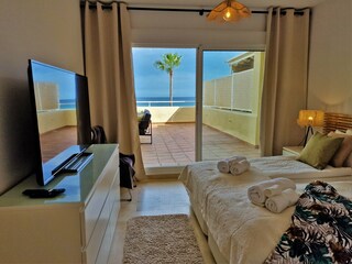 master suite with frontal seaviews