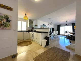 entrance hall with views to kitchen & living room