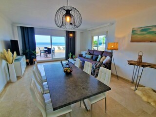 modern & bright lounge area with frontal seaviews