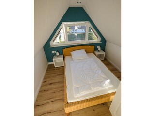 Schlafzimmer im Spitzboden