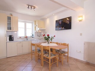 Livingroom with diningarea and kitchen