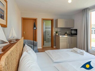 Schlafbereich mit Doppelbett