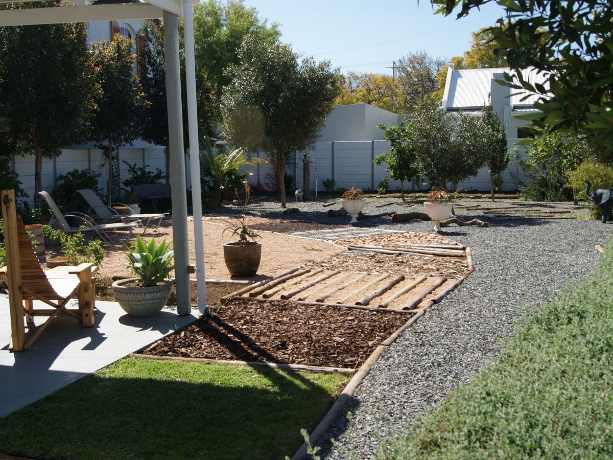 Garden with Vitaparcour, Barefoot path and lemon trees.