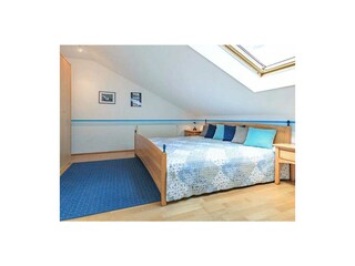 Schlafzimmer mit Doppelbett