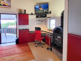 Fernsehecke, Büro und Kamin