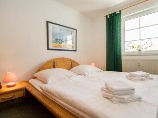 Schlafzimmer mit Doppelbett