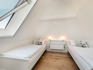 Third bedroom with single beds on top floor