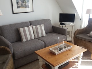 Wohnraum mit komfortablen Schlafsofa