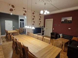 Wohnzimmer EG mit Essbereich für bis zu 18 Personen