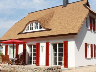 Ferienwohnung im Reetferienhaus direkt am Küstenwald
