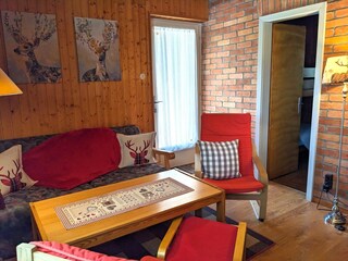 Blick zur Terrasse und zum Schlafzimmer mit Etagenbette