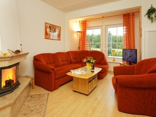 Das Wohnzimmer mit Kamin