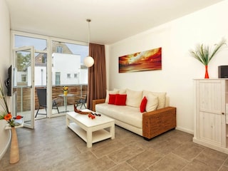 Wohnzimmer mit Balkon