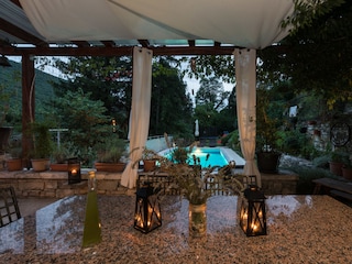 Dining table on the terrace by the pool