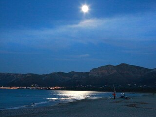 Full moon over Sa Canova beach