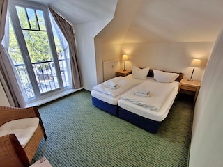 zweites Schlafzimmer mit Doppelbett