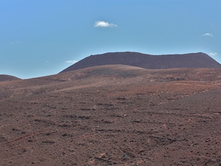 Blick aus dem Garten auf Vulkan
