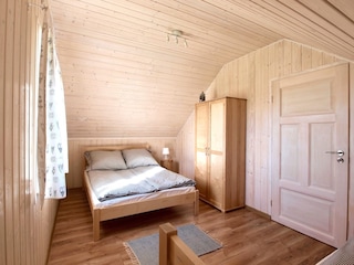 Schlafzimmer mit Doppelbett