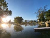 Heated swimming pond