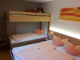 One of the bedrooms in Top 2 with bunk bed