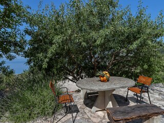 Terrasse mit Grillstelle und Meerblick