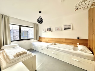 Zimmer mit 3 Einzelbetten