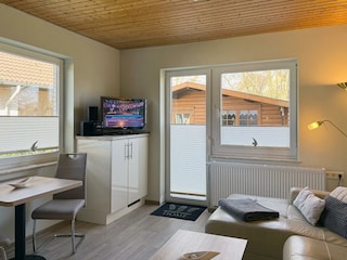 Appartement 11 - Wohnzimmer mit Küchenzeile