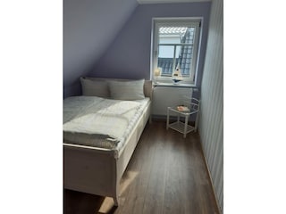 Schlafzimmer mit franz. Bett