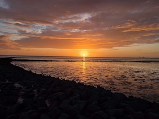 Sonnenuntergang am Deich