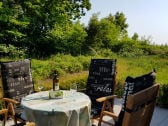 Terrasse mit Blick auf Düne im Sommer