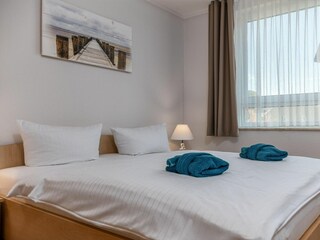 Schlafzimmer mit Doppelbett