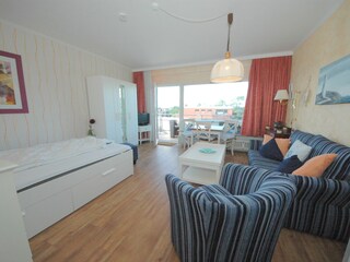 Wohnzimmer mit Bett