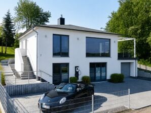 Ferienhaus Elegante Ferienvilla am Schmachter See