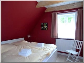 Weiteres Schlafzimmer mit Doppelbett