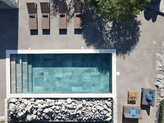 die Außenanlage/der Pool