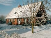 Ferienhaus In der Marsch im Winter.