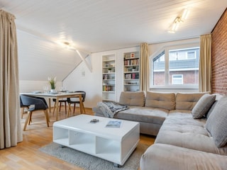 Wohnzimmer mit Schlafsofa