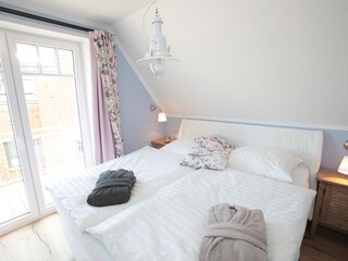 Schlafzimmer mit Dünenblick
