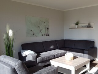 Wohnzimmer Ferienwohnung Dünenblick