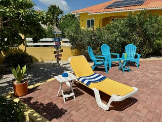 Sun bed and chairs on the pool terrace