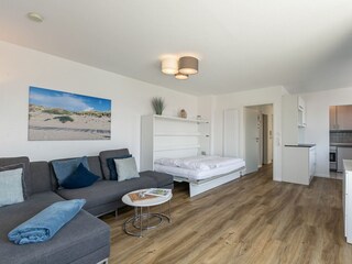 Wohnzimmer mit Klappbett