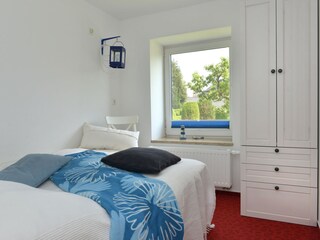 Schlafzimmer mit Doppelbett