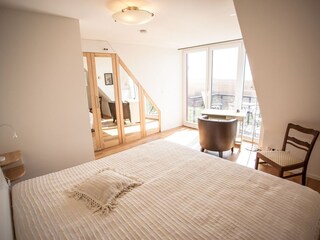 Schlafzimmer mit Doppelbett