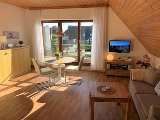 Wohn-/Esszimmer in der Wohnung Meeresbrise