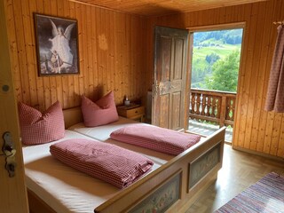 Schlafzimmer mit Balkon