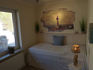 Schlafzimmer mit Einzel-Ausziehbett