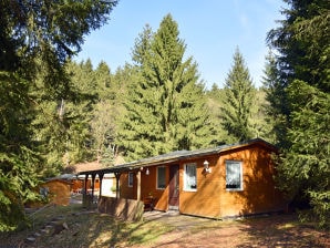 Maison de vacances 2 personnes dans le village de bungalows au bord de la forêt