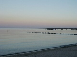 Romantisches Lichtspiel am Meer